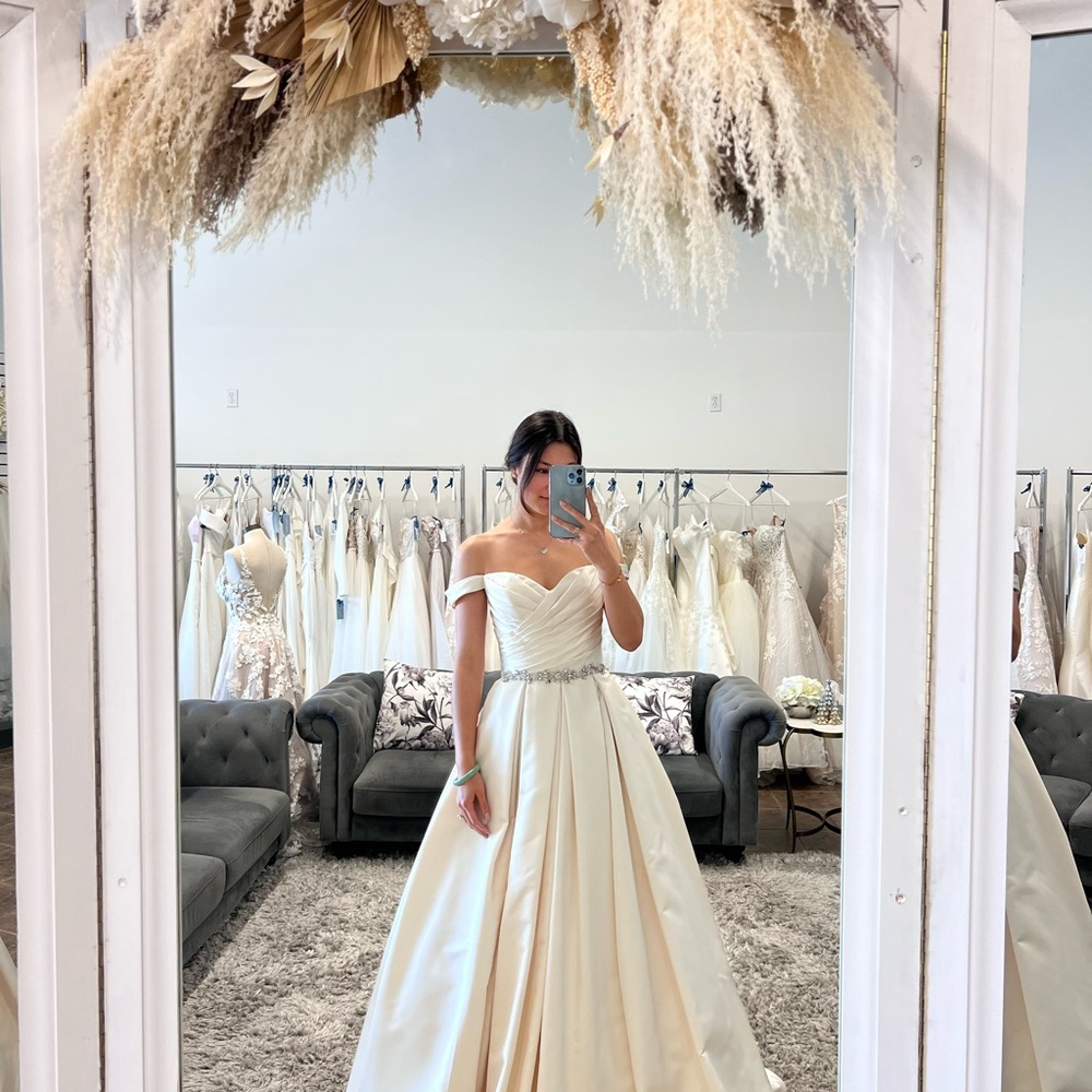 Elegant Off-Shoulder Satin Wedding Gown with Crystal Belt